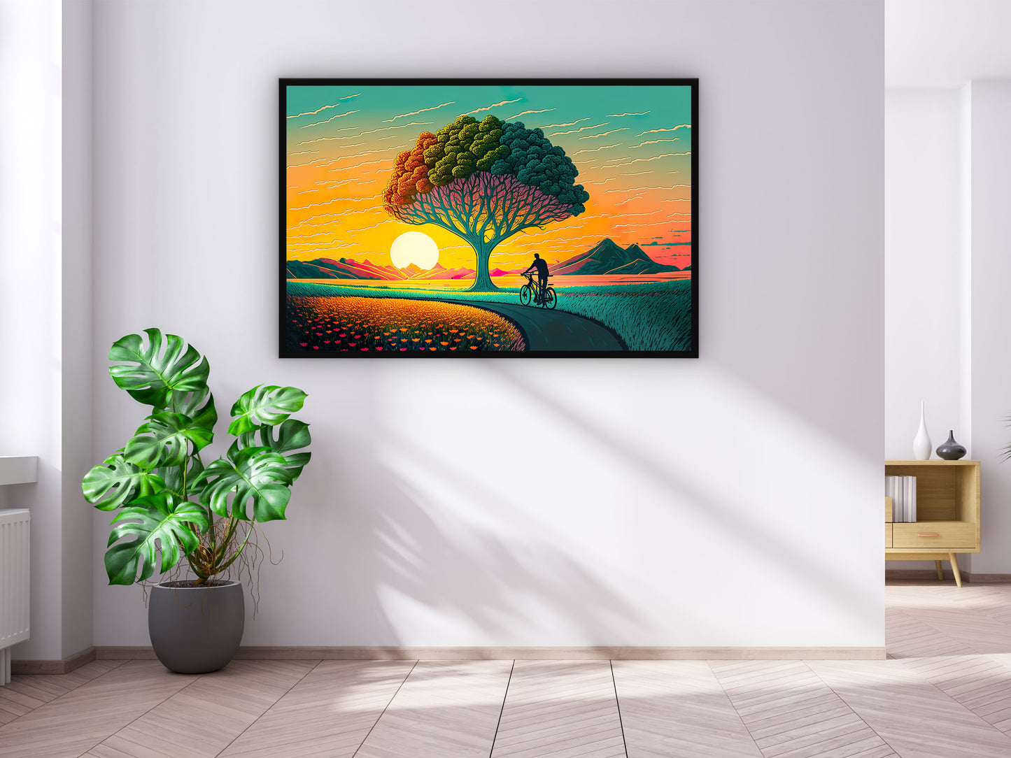 Painting of A Man Bike Riding Front of A Tree With a Sunset in The Background